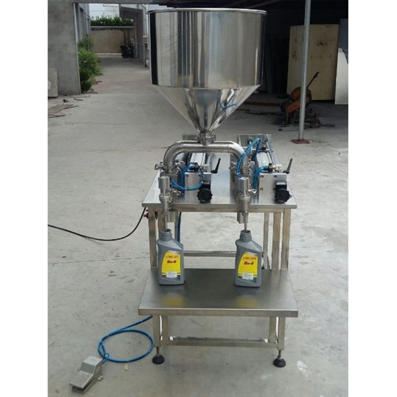 多彩漆灌裝機(jī) 供應(yīng)雙頭灌裝1-5升潤滑油灌裝機(jī) 膏體灌裝機(jī)防爆液體灌裝機(jī)